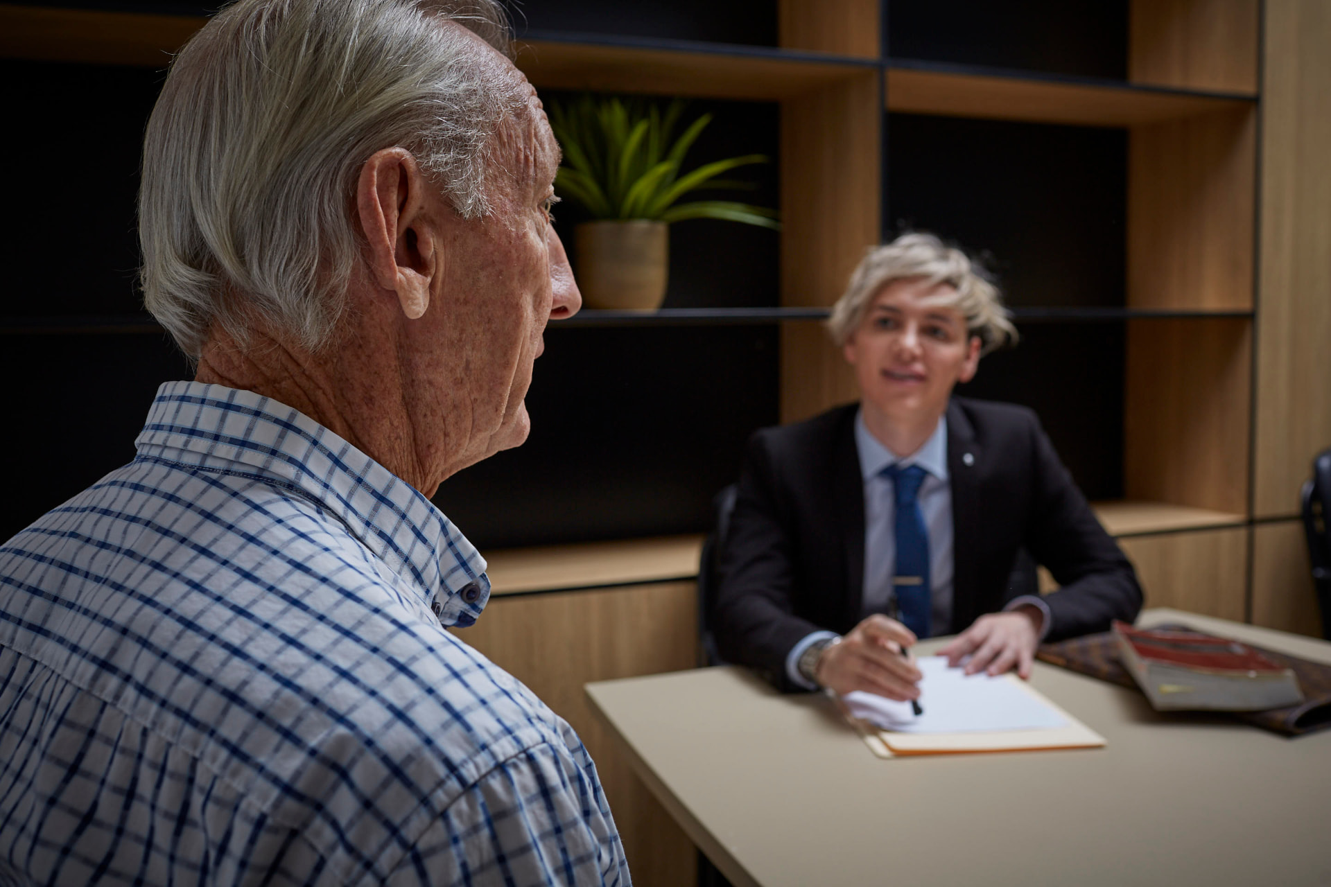 Marty meeting clients around a boardroom table