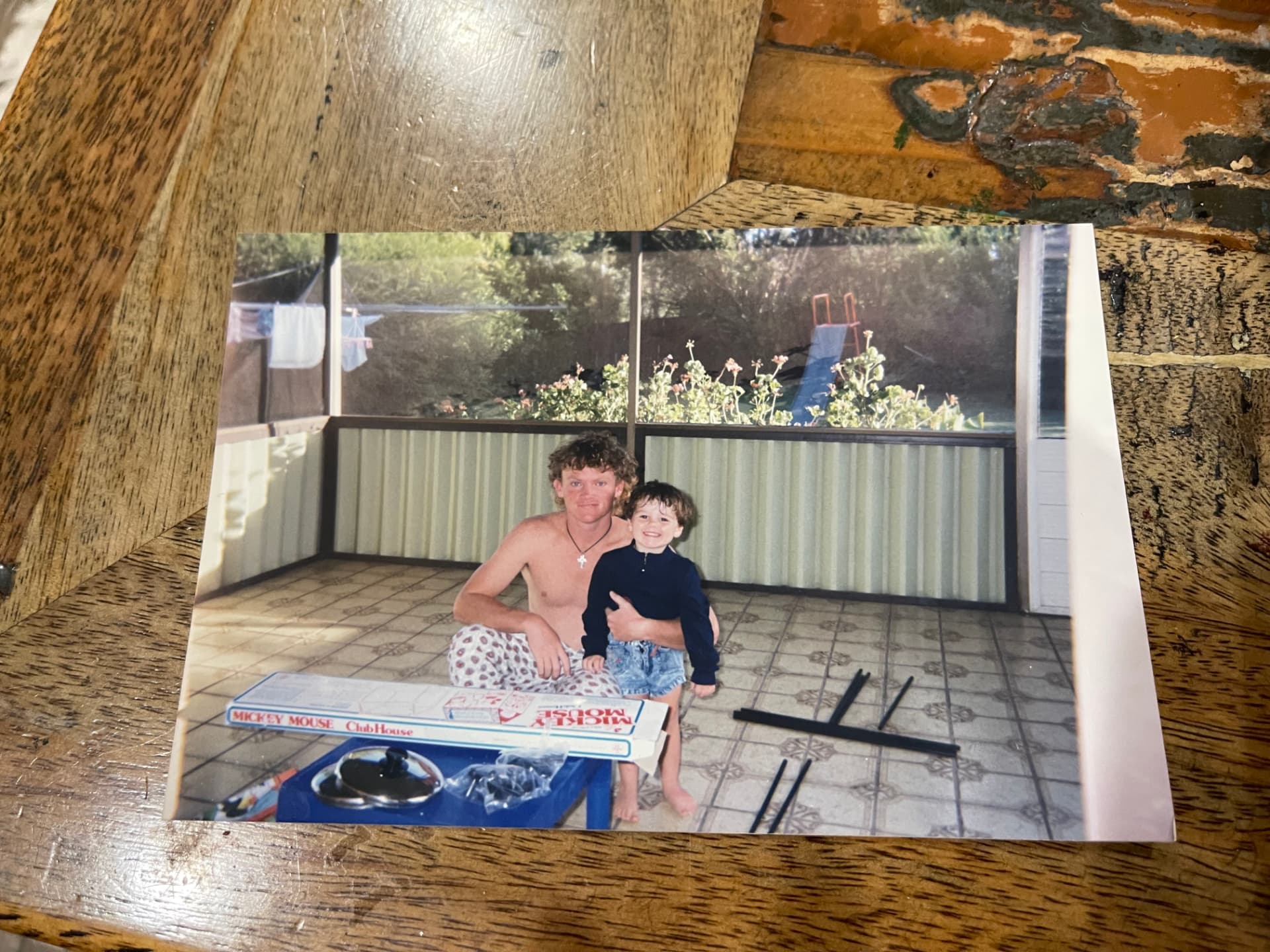 Marty as a child with his dad building a Mickey Mouse clubhouse