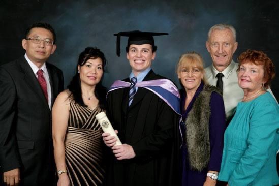 Marty with family on graduation day